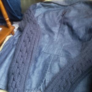 Blue denim jacket with sweater sleeves